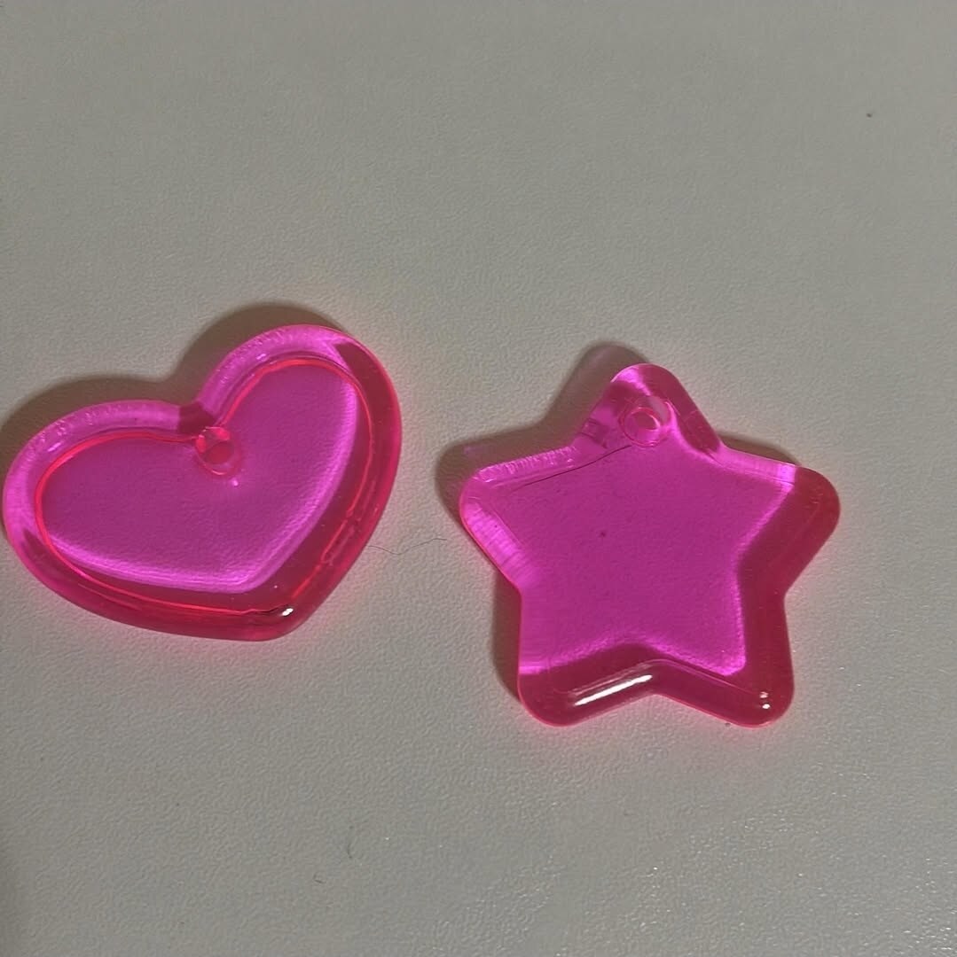 Translucent pink heart & star charms